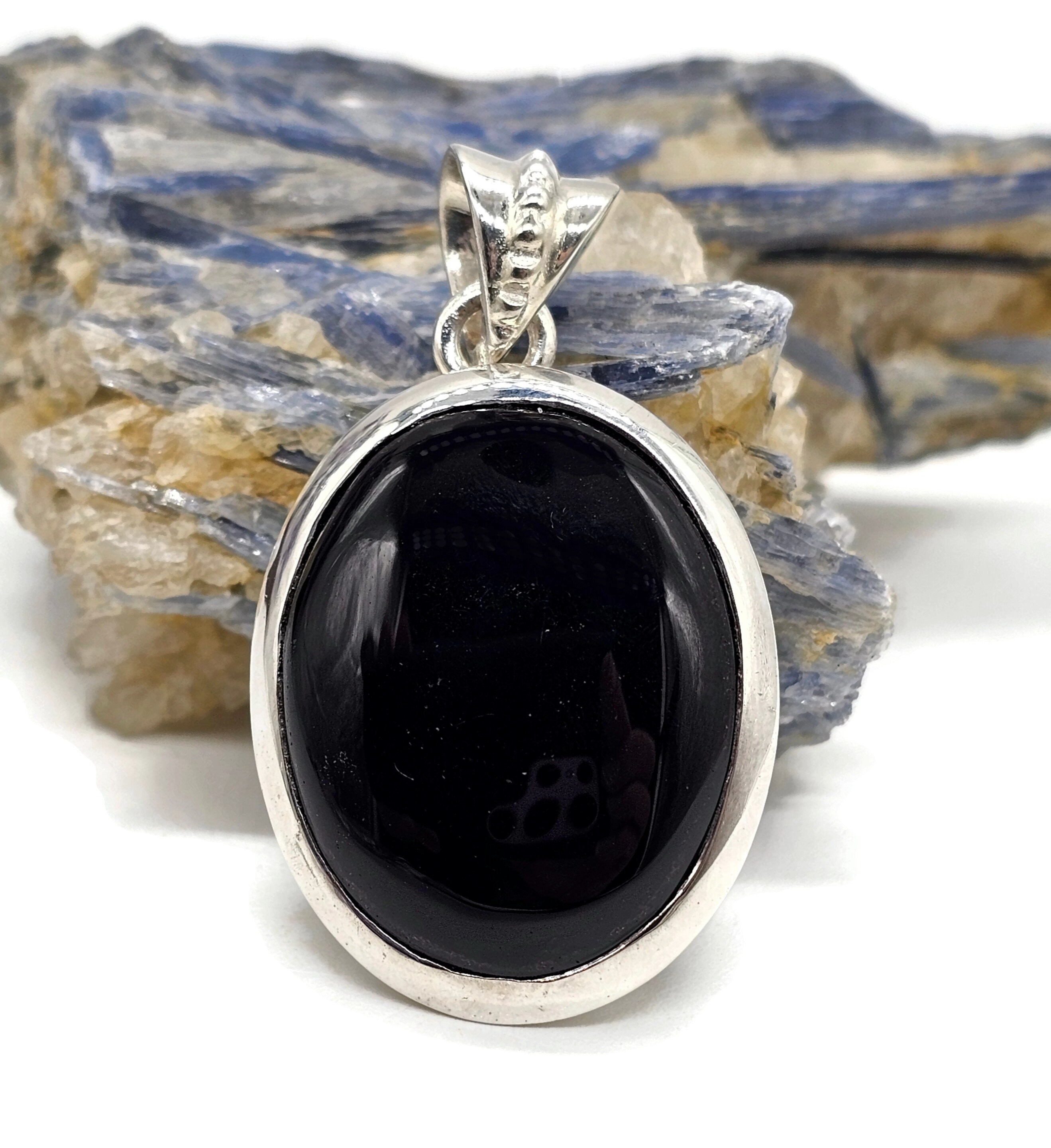 Elegant Black Onyx and Silver Pendant for Leo Zodiac Protection