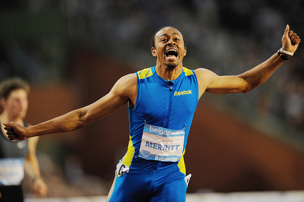 aries merritt blue and yellow reebok spikes