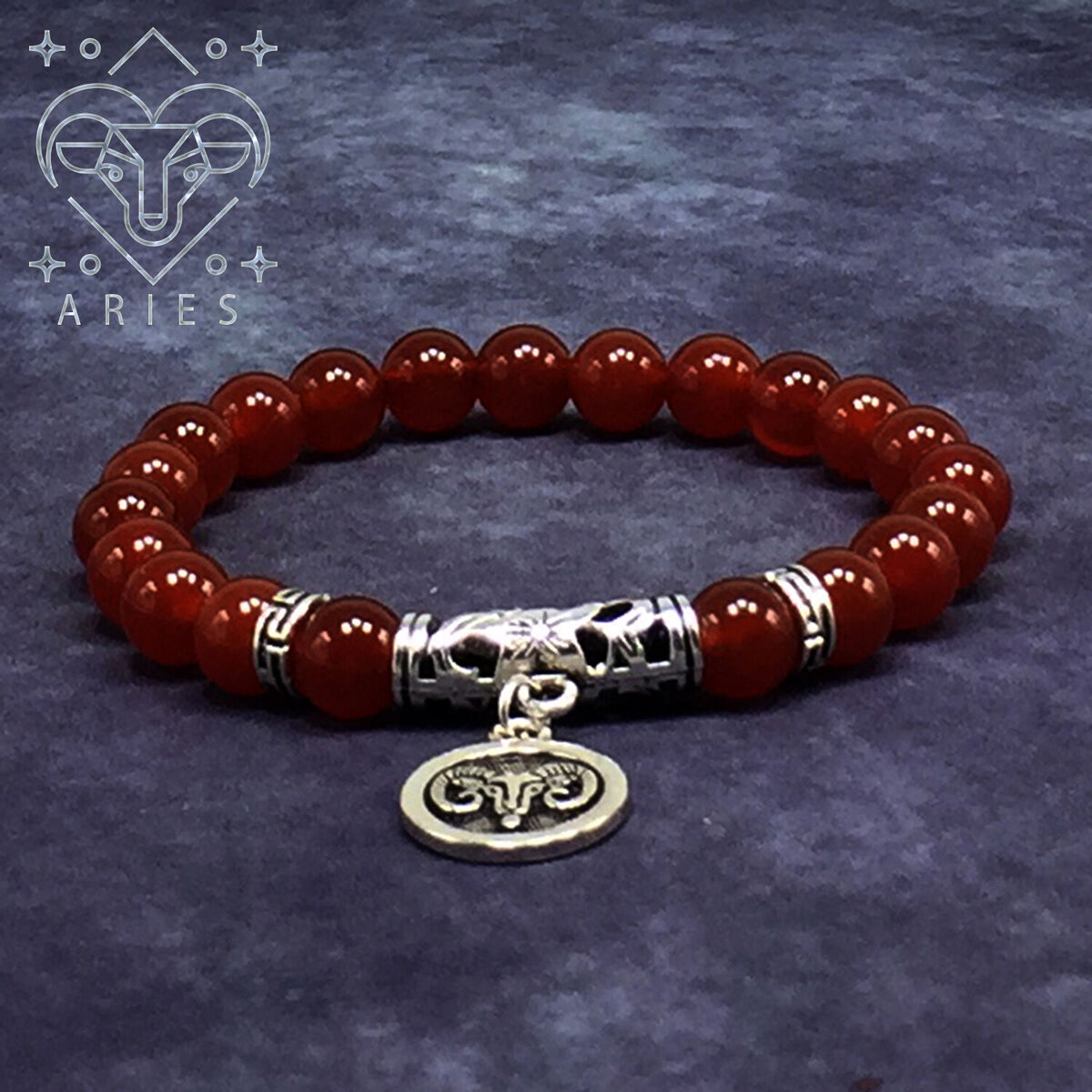 gold aries in red agate